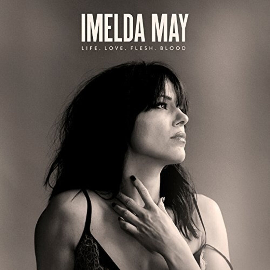 the album cover for Imelda May - Life Love Flesh Blood