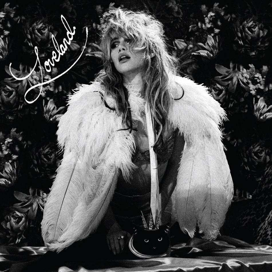 the album cover for Suki Waterhouse - Loveland [Red LP/Poster]