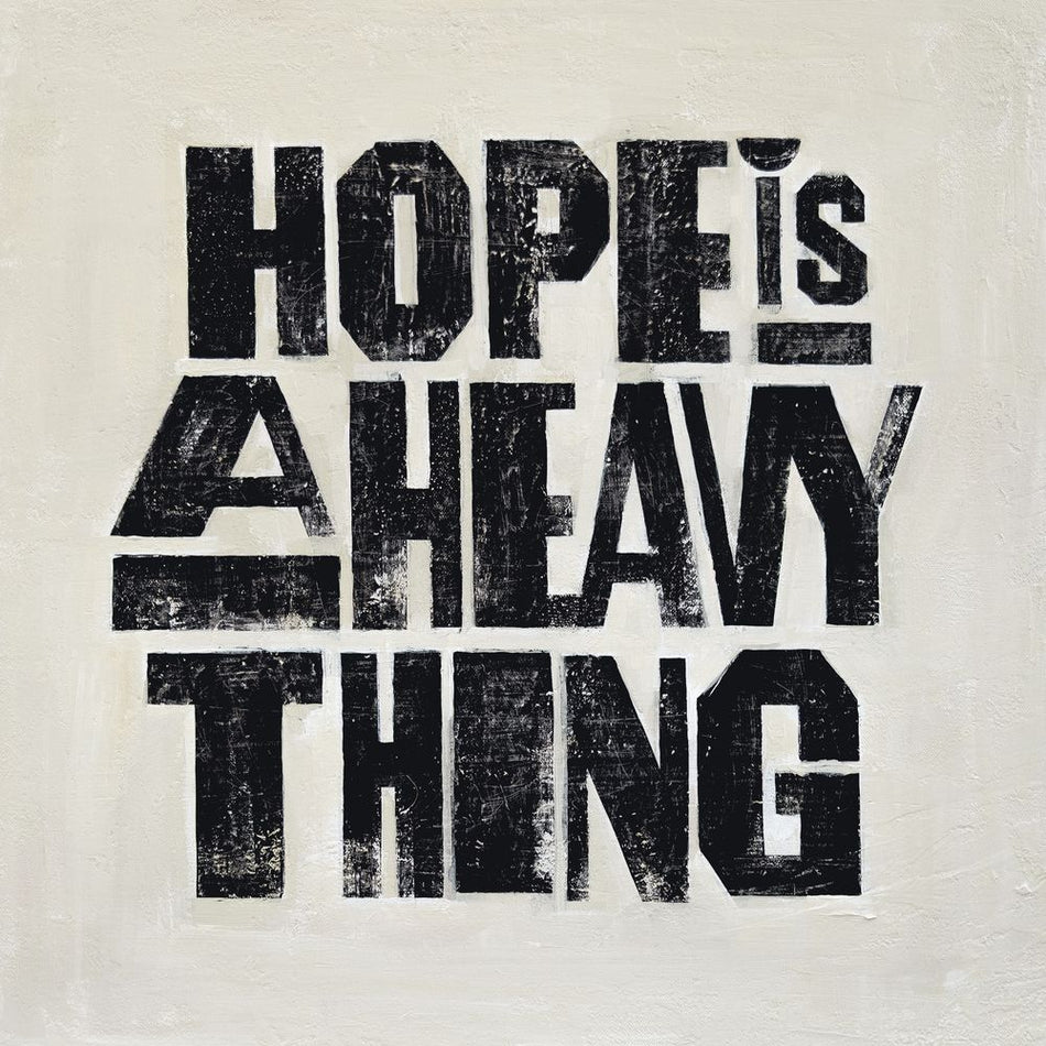 the album cover for Joy Oladokun - Hope Is A Heavy Thing [Indie Exclusive Eco-Friendly Gray Blend]