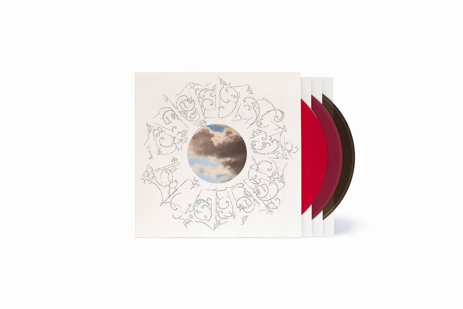 the album cover for Mac Miller - The Divine Feminine - 10th Anniversary [Apple + Fruit Punch + Black Ice]
