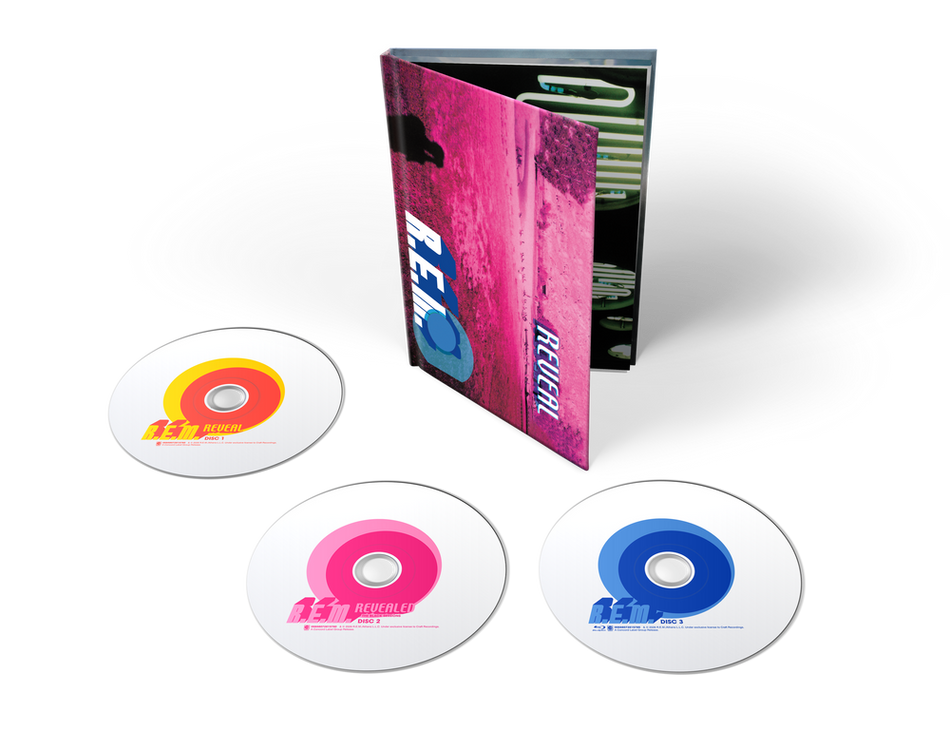 the album cover for R.E.M. - Reveal - 25th Anniversary Edition [2 CD + BR * hardbound book]