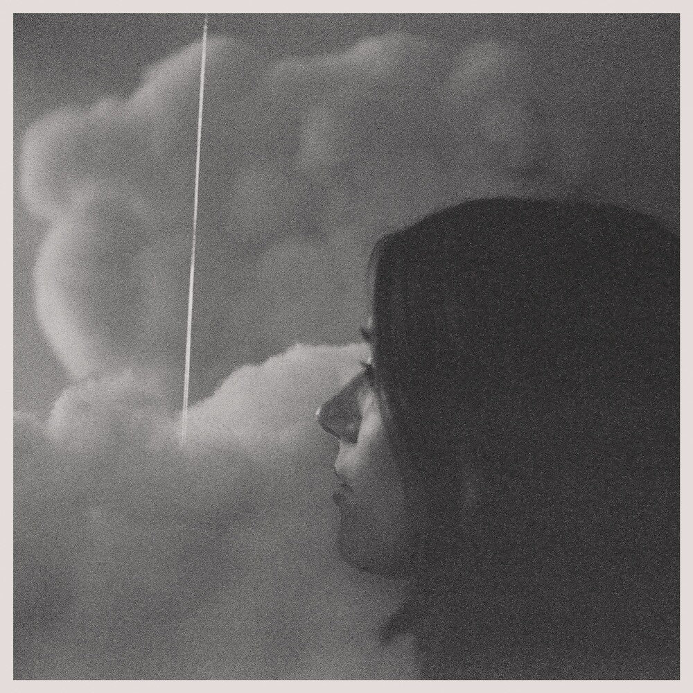 the album cover for Gia Margaret - Romantic Piano [Seaglass Wave Translucent LP]