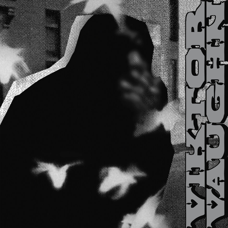 the album cover for Viktor Vaughn - Vaudeville Villain - Silver [Colored Vinyl] (Slv)