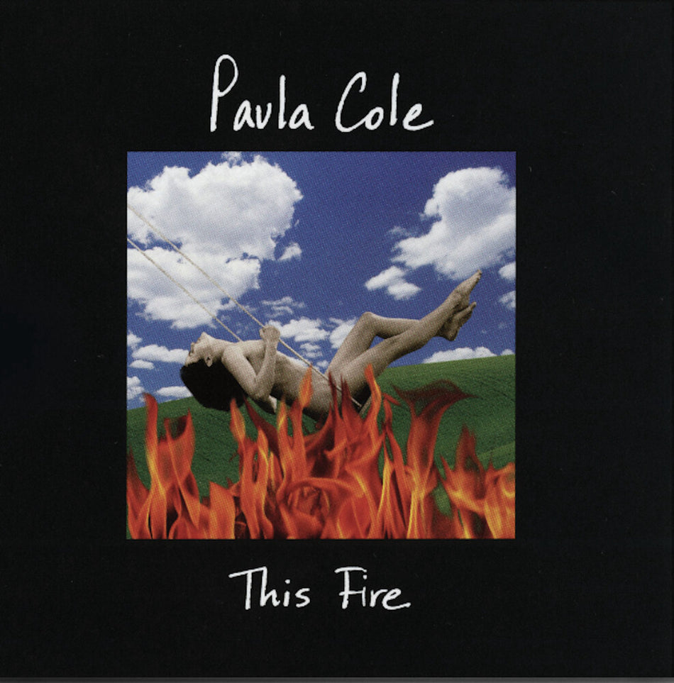 the album cover for Paula Cole - This Fire [Indie Exclusive Limited Edition Blue Vinyl] (Aniv)