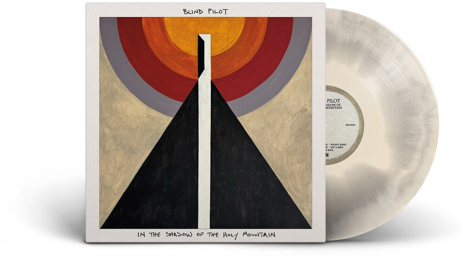 the album cover for Blind Pilot - In The Shadow Of The Holy Mountain [Indie Exclusive White &amp; Beige LP]