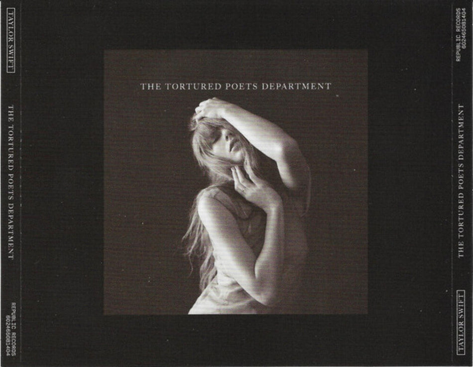 the album cover for Taylor Swift - Tortured Poets Department: The Black Dog [Deluxe]