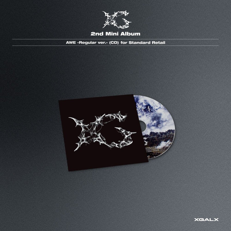 the album cover for XG - Awe (Stic) (Trdc) [With Booklet] (Phot)