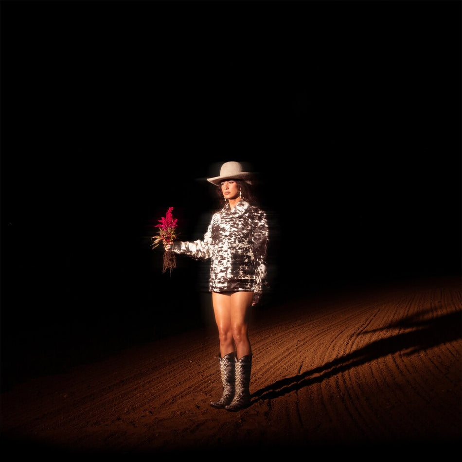 the album cover for Kassi Ashton - Made From The Dirt: The Blooms (Bonus Tracks)