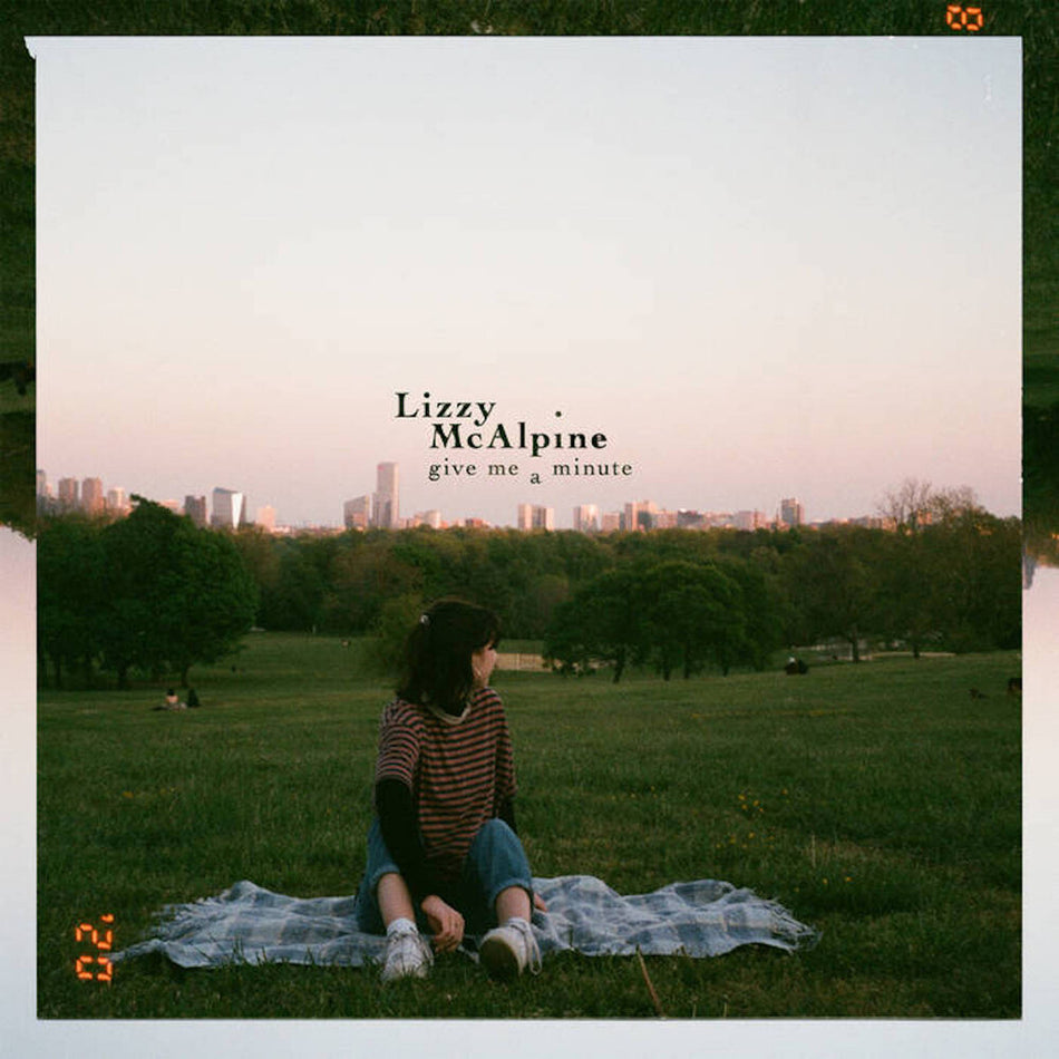 the album cover for Lizzy McAlpine - Give Me A Minute - Green [Colored Vinyl] (Grn)