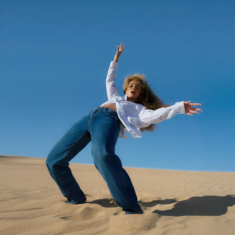 the album cover for Ella Eyre - everything, in time [Yellow Vinyl LP]