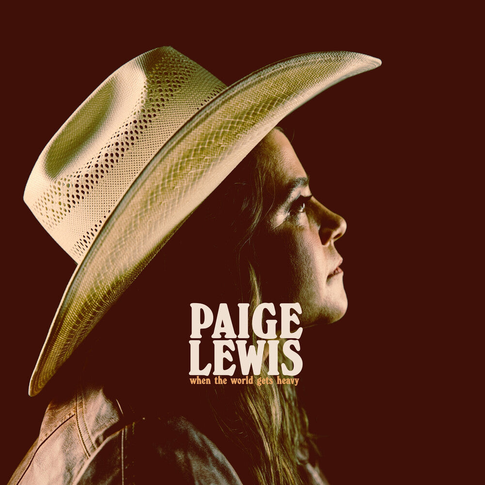 the album cover for Paige Lewis - When The World Gets Heavy